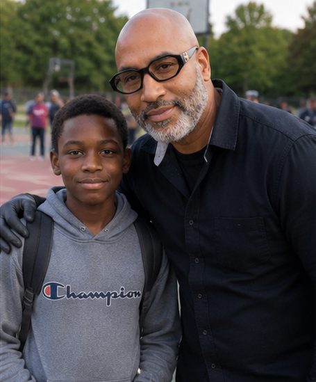 Nathan E. Brooks encouraging a young community member