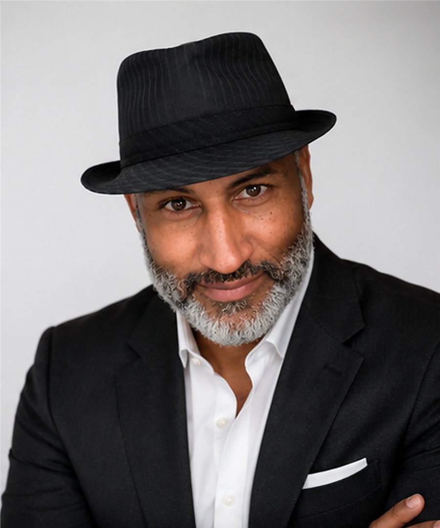 Professional portrait of author Nathan E. Brooks
